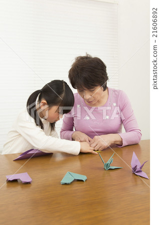 Folding origami grandson and grandmother girl senior origami Folding origami grandson and grandmother girl senior origami 21606892