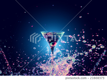 Colourful cocktail in glass with splash 21608373
