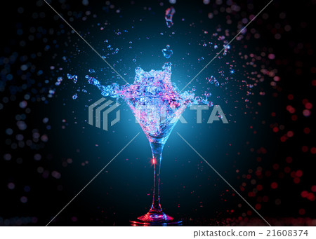 Colourful cocktail in glass with splash Colourful cocktail in glass with splash 21608374