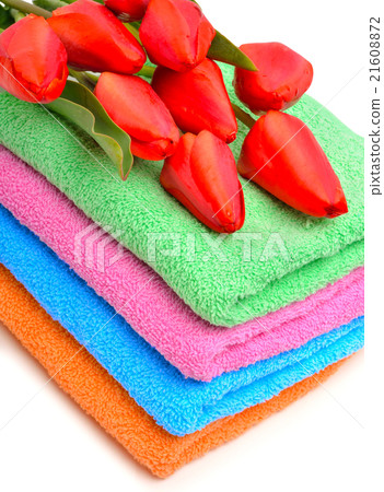 towels and red tulips 21608872