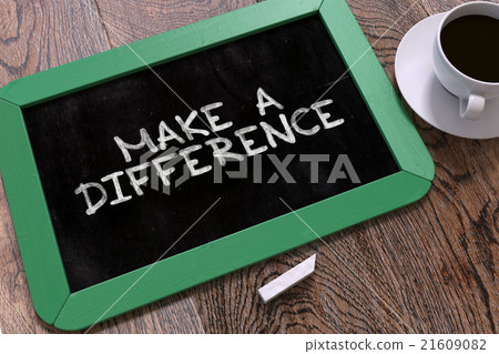 Make a Difference Handwritten on Chalkboard. 21609082