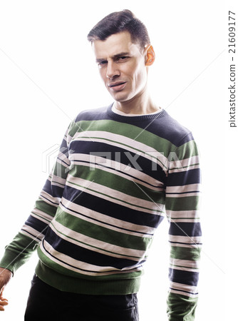 Portrait of a smart serious young man standing Portrait of a smart serious young man standing 21609177