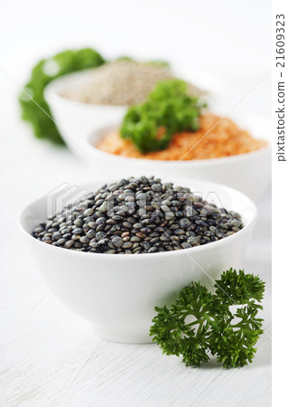Bowls of assorted dried lentils Bowls of assorted dried lentils 21609323
