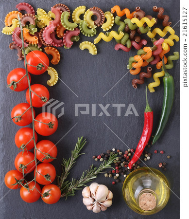 pasta of different colors, tomatoes, garlic pasta of different colors, tomatoes, garlic 21615127