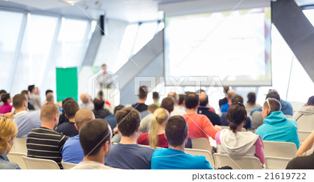 Male speeker having talk at public event. Male speeker having talk at public event. 21619722