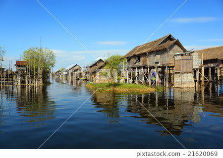 Stilted houses in village on Inle lake Stilted houses in village on Inle lake 21620069