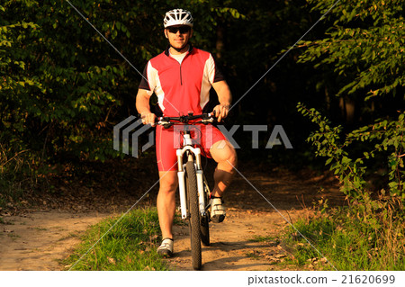 Rider on Mountain Bicycle it the forest 21620699