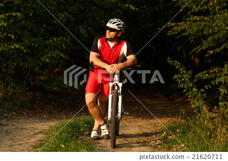 Rider on Mountain Bicycle it the forest Rider on Mountain Bicycle it the forest 21620711