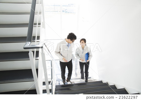 Men and women in work clothes Men and women in work clothes 21622297