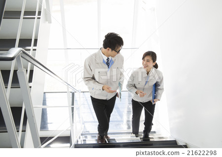 Men and women in work clothes 21622298