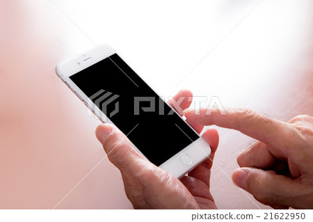 Grandpa's hand Handling smartphone Senior smartphone operating grandpa copy space 21622950