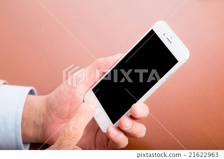 Grandpa's hand Handling smartphone Senior smartphone operating grandpa copy space 21622963