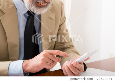 Grandpa's hand Handling smartphone Senior smartphone operating grandpa copy space 21622974