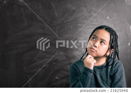 Closeup portrait of Cute little girl thinking 21625048