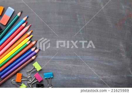 School supplies on blackboard background 21625989