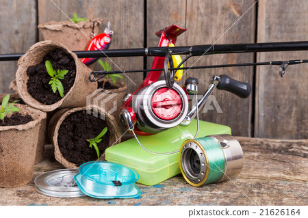 fishing tackles on natural background fishing tackles on natural background 21626164