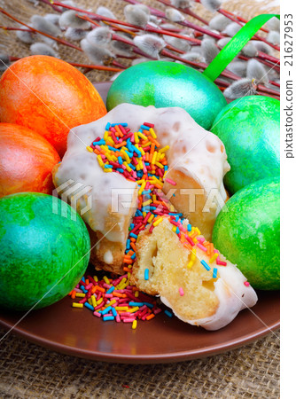 Easter eggs and cake on a plate Easter eggs and cake on a plate 21627953