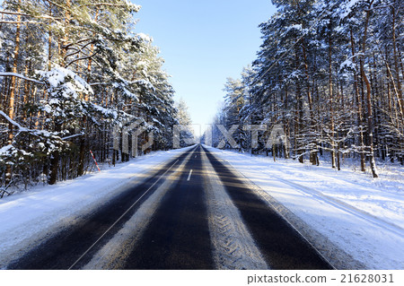 winter road .  snow 21628031