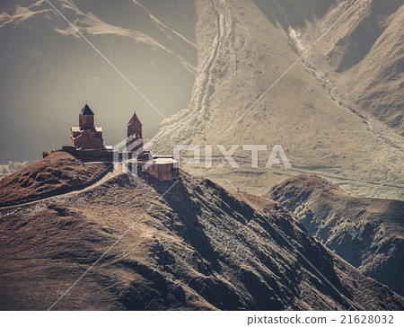 Mediaeval Church in mountains 21628032