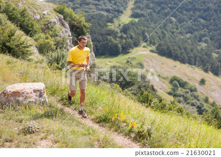 Running man in the mountains Running man in the mountains 21630021