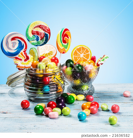 multicolored lollipops, candy and chewing gum 21636582