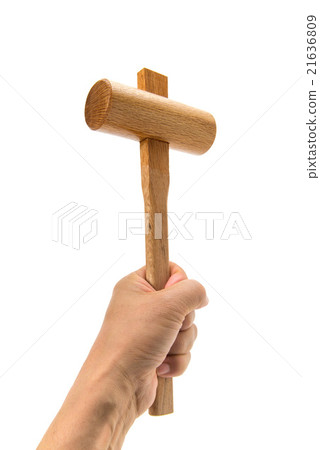 A mallet held in a man's hand 21636809
