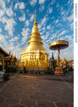 Golden Pagoda at Wat Phra That Hariphunchai Golden Pagoda at Wat Phra That Hariphunchai 21636968