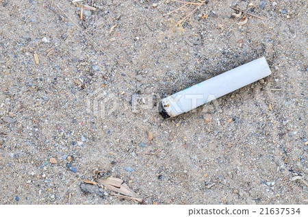 Cigarette butts on the floor Cigarette butts on the floor 21637534