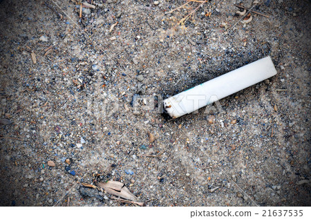 Cigarette butts on the floor Cigarette butts on the floor 21637535