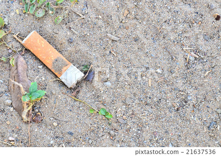 Cigarette butts on the floor Cigarette butts on the floor 21637536