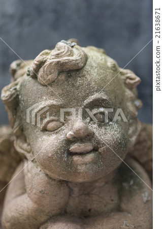 baby cupid,Sculpture at a Melbourne cemetery. 21638671