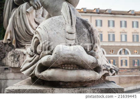 Ancient dolphin sculpture on Piazza del Popolo 21639445