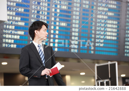 Businessman waiting for departure time Businessman waiting for departure time 21642888