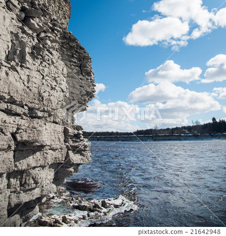 rock and river on background of blue sky rock and river on background of blue sky 21642948