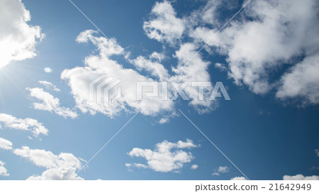 white fluffy clouds in blue sky white fluffy clouds in blue sky 21642949