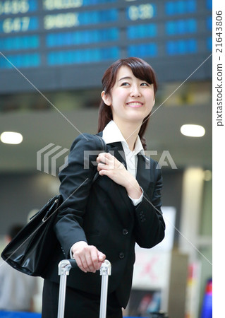 Waiting for departure time business woman 21643806