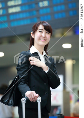 Waiting for departure time business woman 21643807