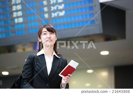 Waiting for departure time business woman 21643808