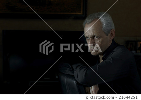 Elderly man - portrait in dark tones 21644251