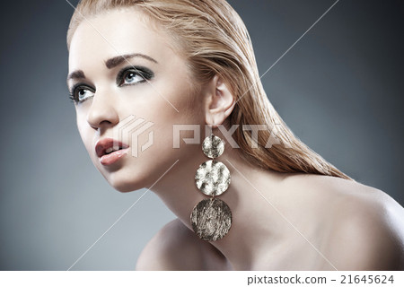 Beautiful woman with earrings. Jewelry and Beauty 21645624