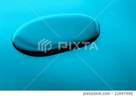 Drop of water on the blue table Drop of water on the blue table 21647098
