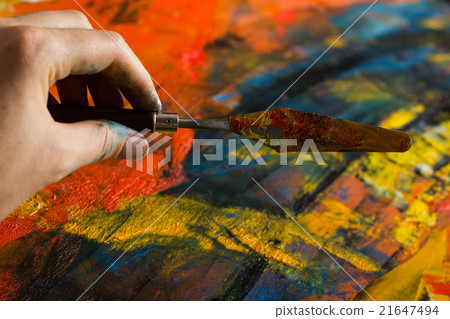 Abstract painted canvas. Oil paints on a palette. 21647494