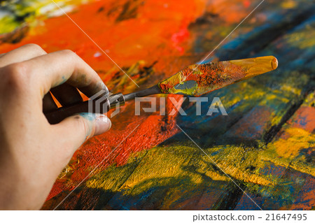 Abstract painted canvas. Oil paints on a palette. 21647495