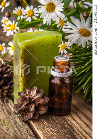 Spa set with flowers on the wooden table Spa set with flowers on the wooden table 21648513