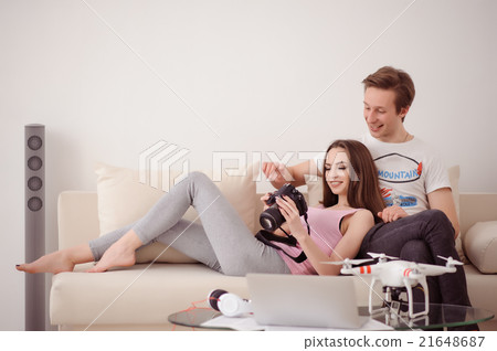 Young loving couple resting on the couch 21648687