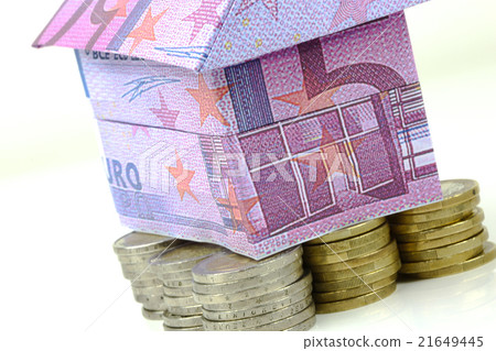 Euro bank notes House and coins 21649445