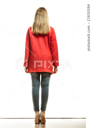 fashion woman in vivid color red coat rear view fashion woman in vivid color red coat rear view 21650384