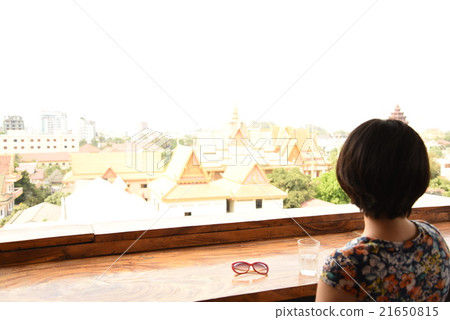 A woman looking out 21650815