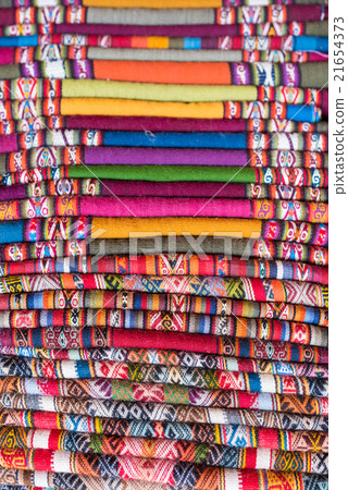 Colorful peruvian blanket for sale in the market  21654373
