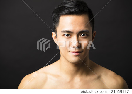 Closeup portrait of attractive young man face 21659117